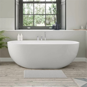 A white freestanding bath with chrome fittings by Tissino.