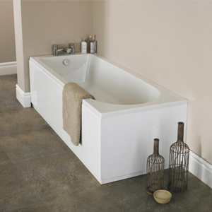 White Nuie branded bath in an off-white ceramic tile surround