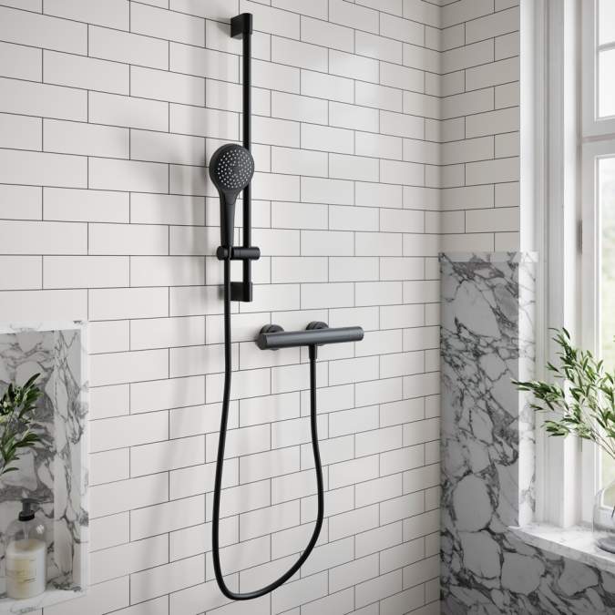 Black shower mount and shower head by Villeroy & Boch